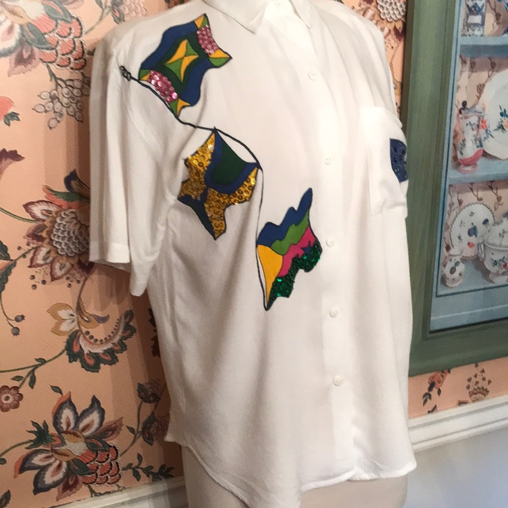Shirt with sequin flags. Perfect for yachting, and sailing, cruising.
